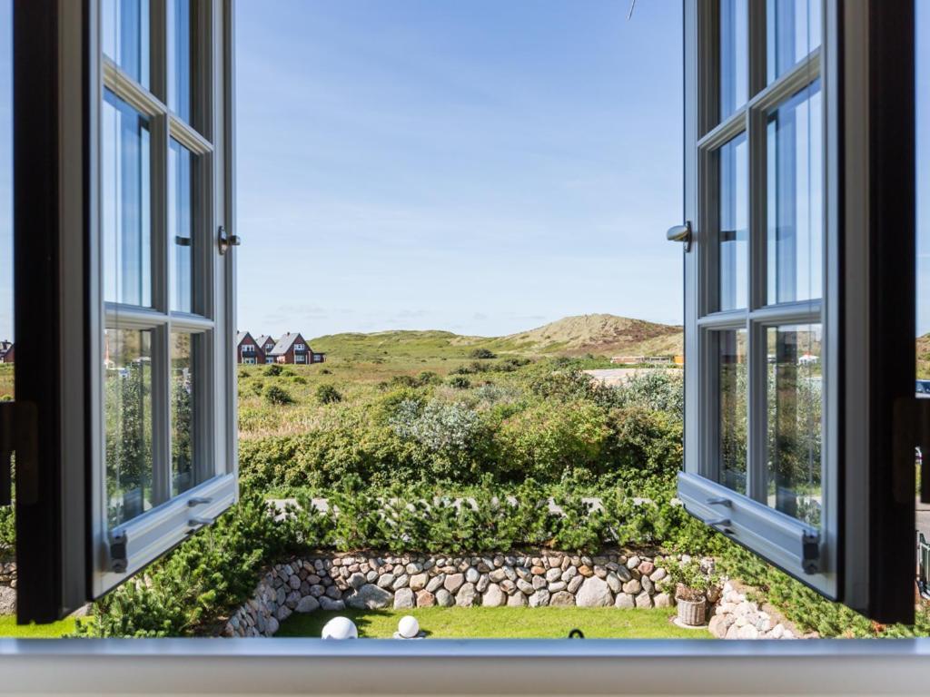 Ferienhaus Luxuriöse Doppelhaushälfte Mit Terrasse, Kamin Und Wlan In Bester Lage Wenningstedt-Braderup